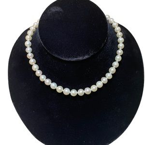 8-8.5 mm round Japanese freshwater cultured pearls. Gold plated clasp